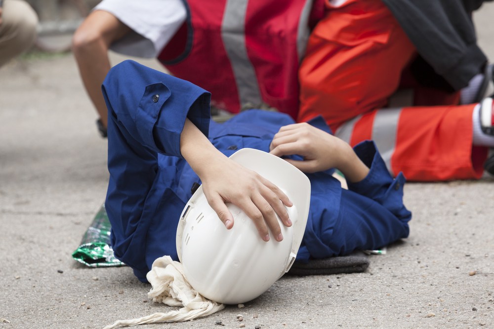 construction worker lying on the ground