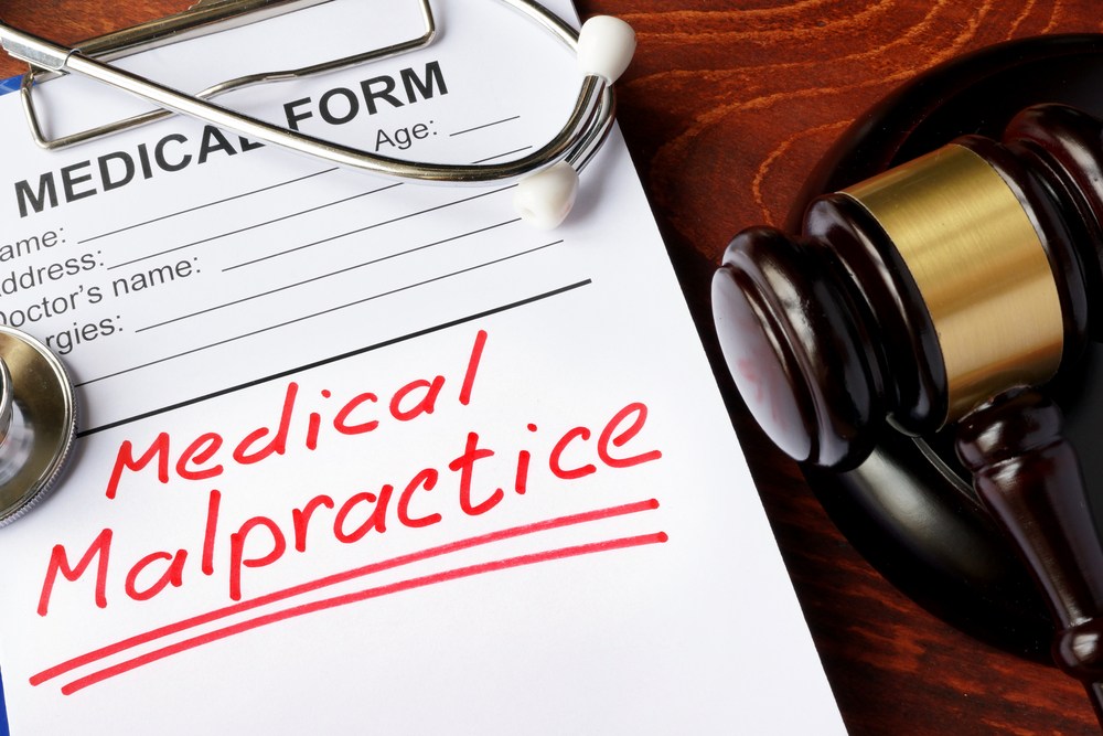 gavel and medical malpractice form