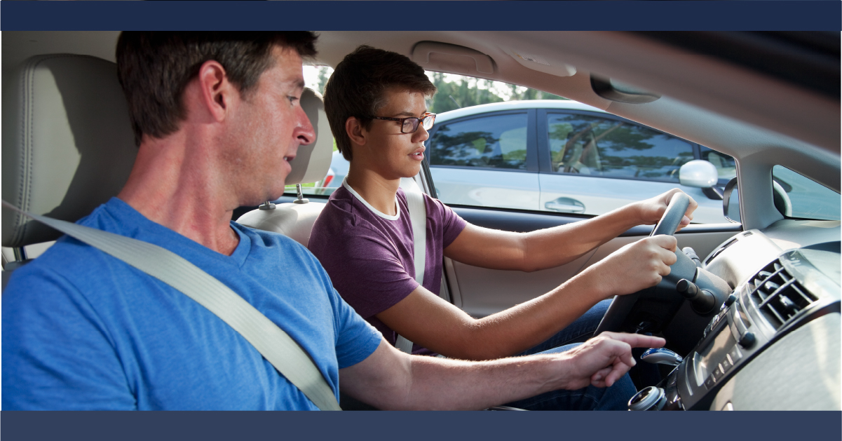Father teaching teen to drive