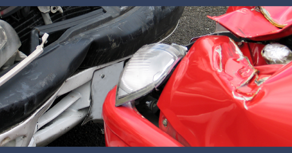 Close up image of damage to two crashed cars