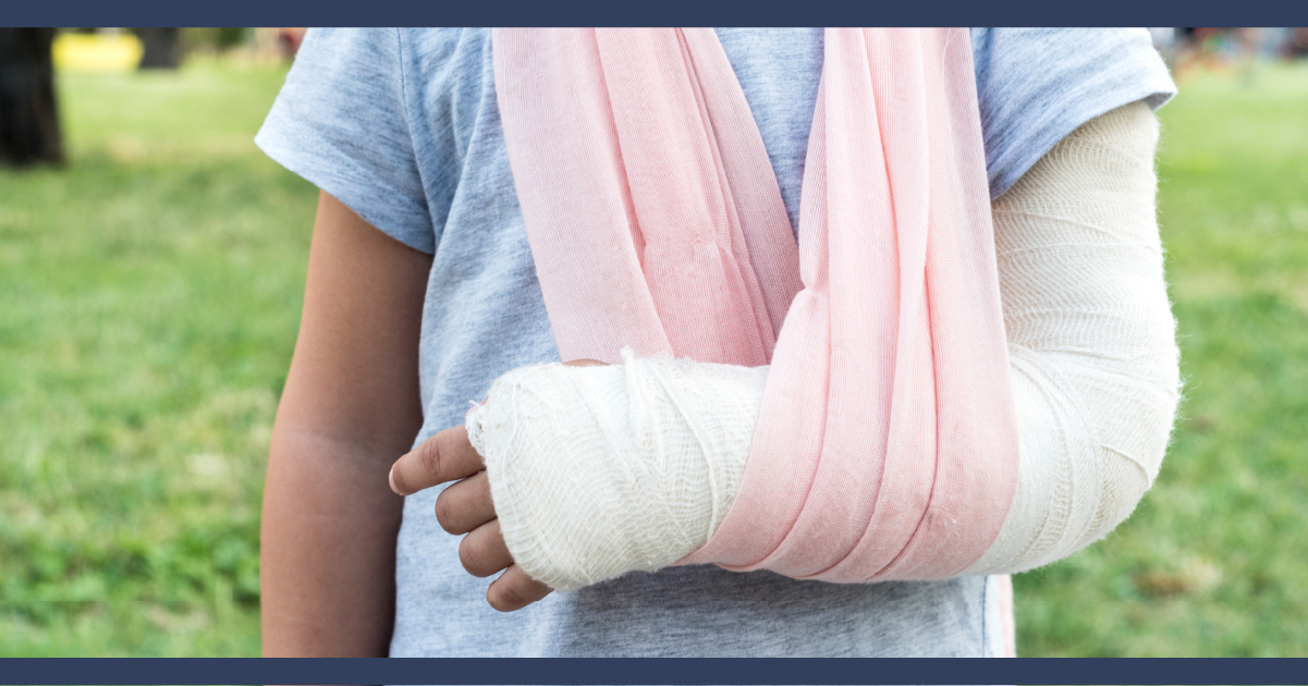 Person with arm in a cast and a sling