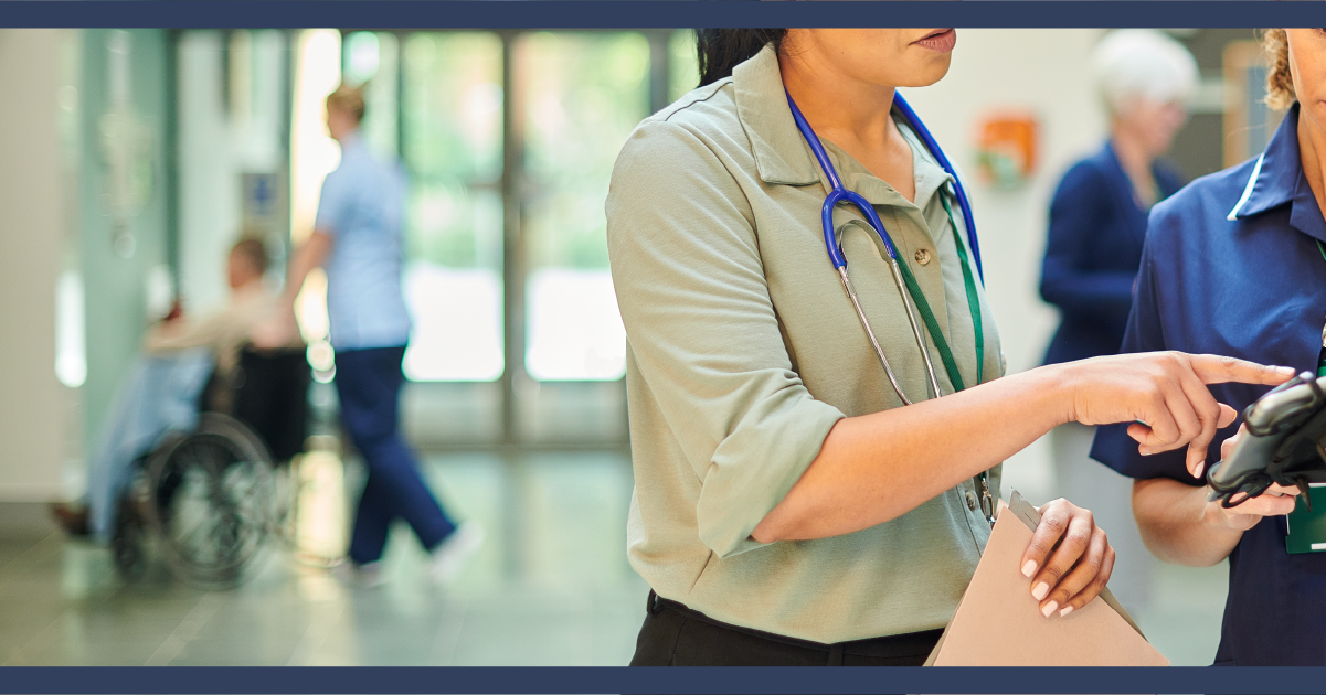 Doctor and nurse reviewing medical notes