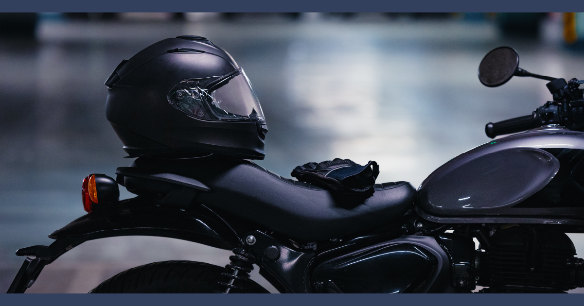 Matt black motorcycle with helmet