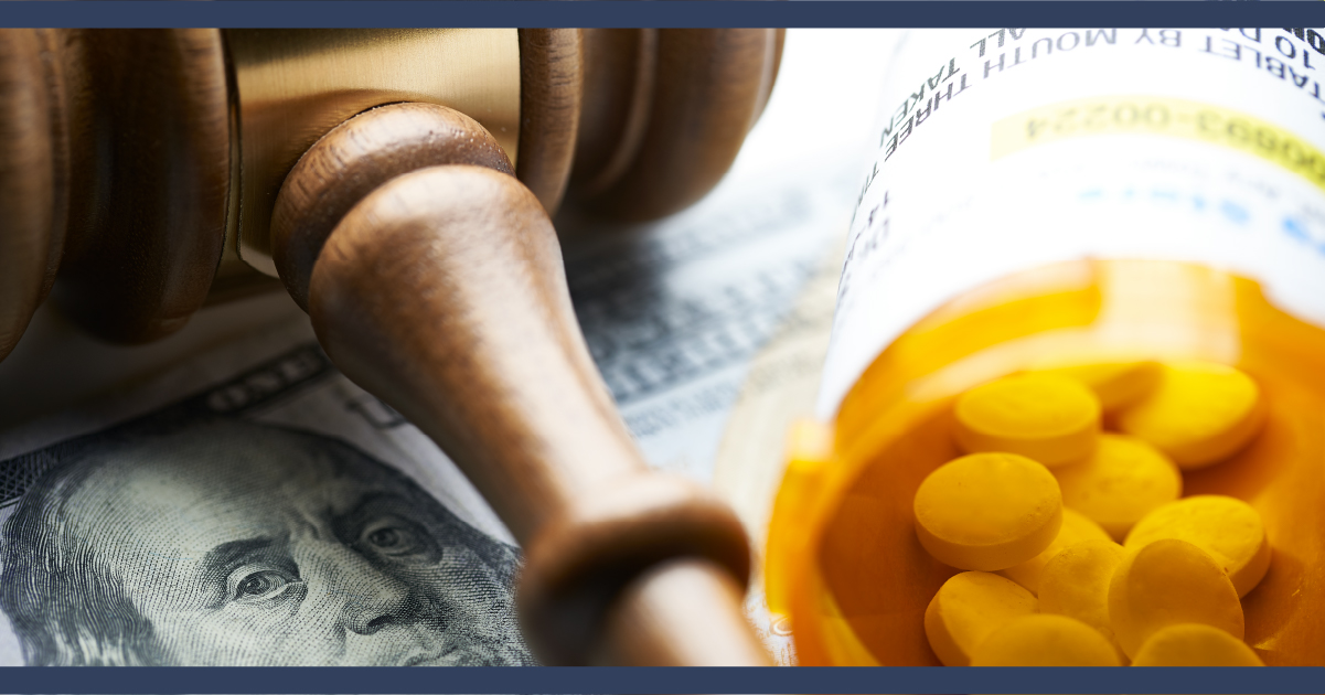Judge's gavel and a bottle of prescription pain medicine