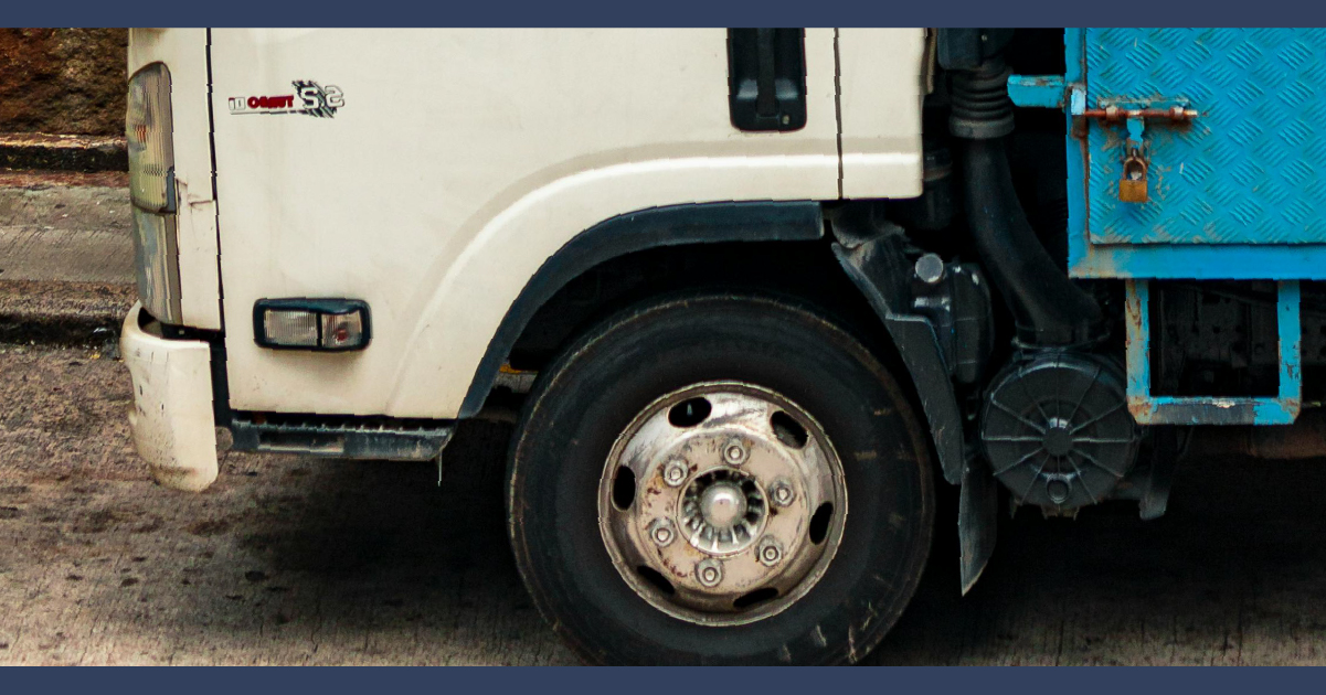 Close up of truck cab and wheel
