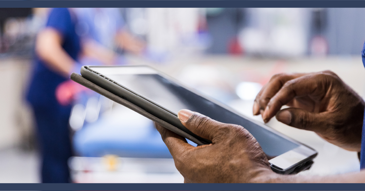 Doctor looking at brain scan on a tablet device