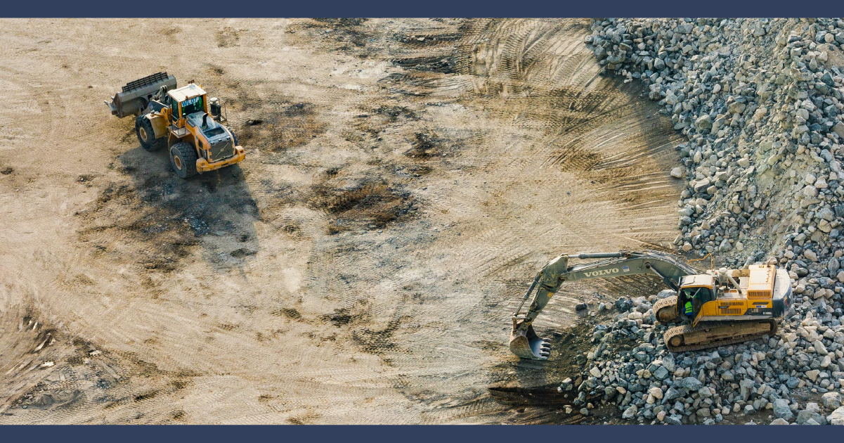 Construction vehicles on a worksite