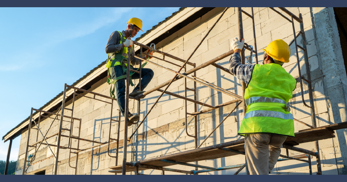 Construction workers on scaffolding