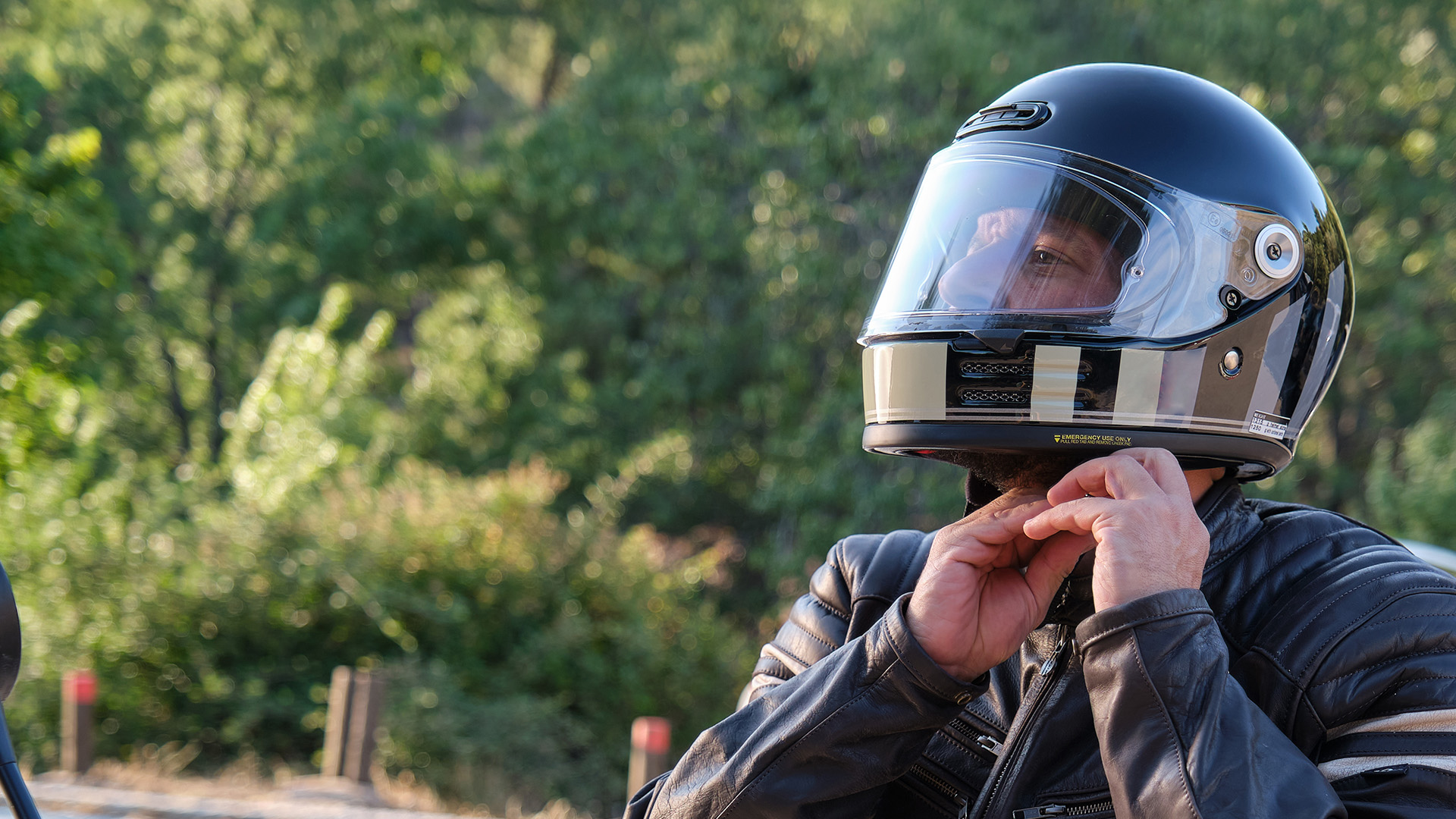 Rider with helmet and protective gear